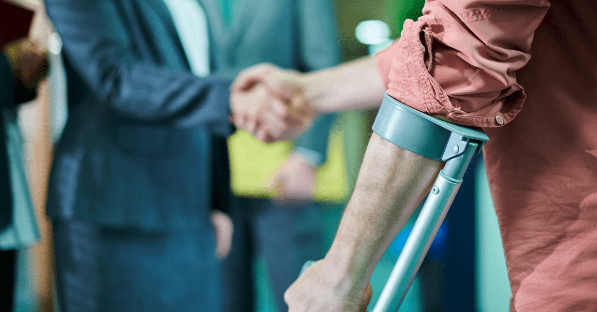 injured crutches handshake