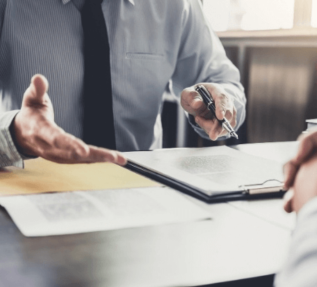 lawyer holding pen and form